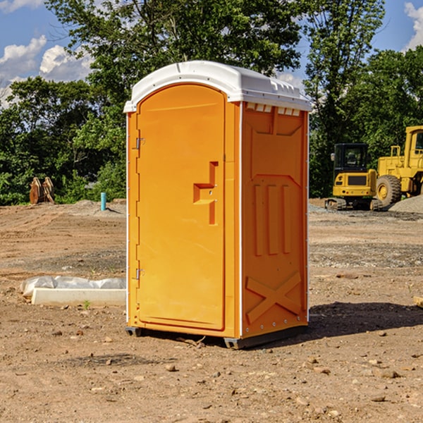 how often are the portable restrooms cleaned and serviced during a rental period in Raymond